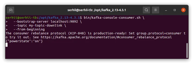 Terminal running kafka-console-consumer.sh on my-topic-downlink, echoing back the published record powerState on