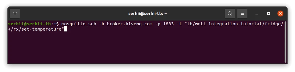 Terminal window with mosquitto_sub subscribed and waiting for downlink messages