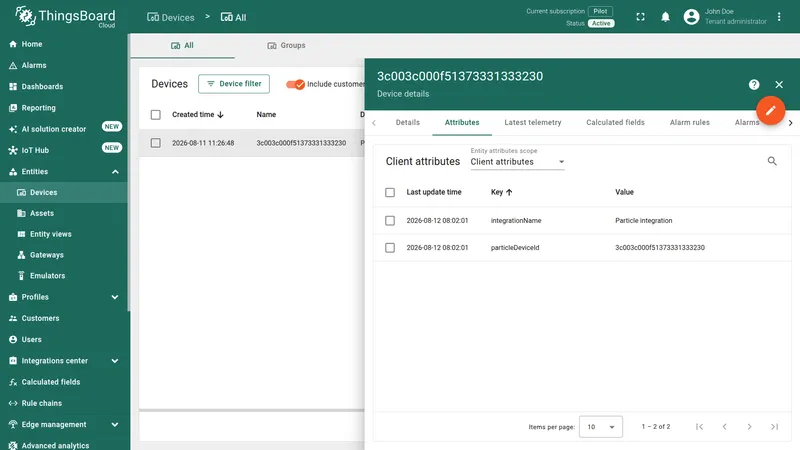 ThingsBoard Device details — Attributes tab, Client attributes showing integrationName Particle integration and particleDeviceId