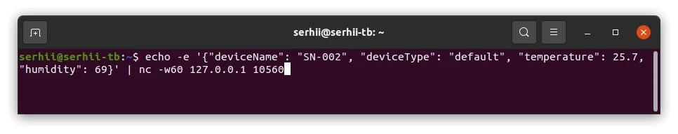 Terminal — JSON message sent; connection kept open with -w60 to receive a downlink response