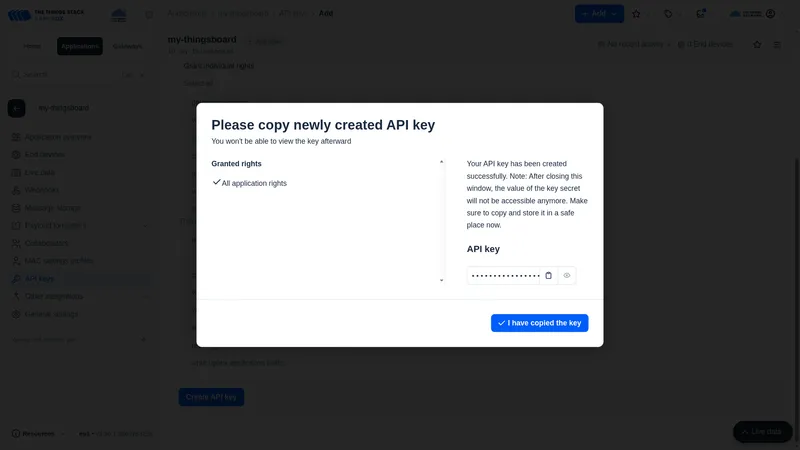 Generated API key displayed with copy button and warning that it cannot be viewed again